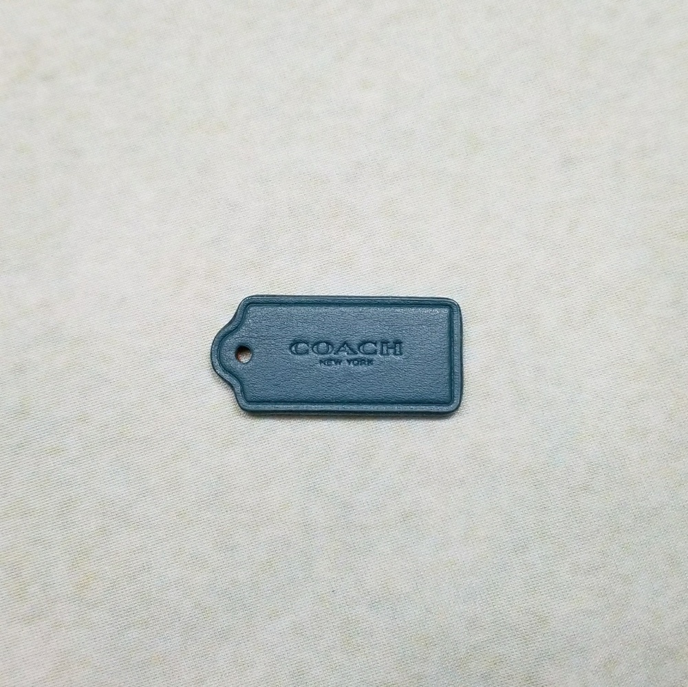 Turquoise Coach Tag